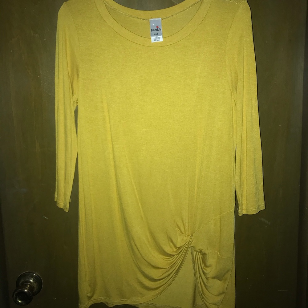 Never worn. Mustard color